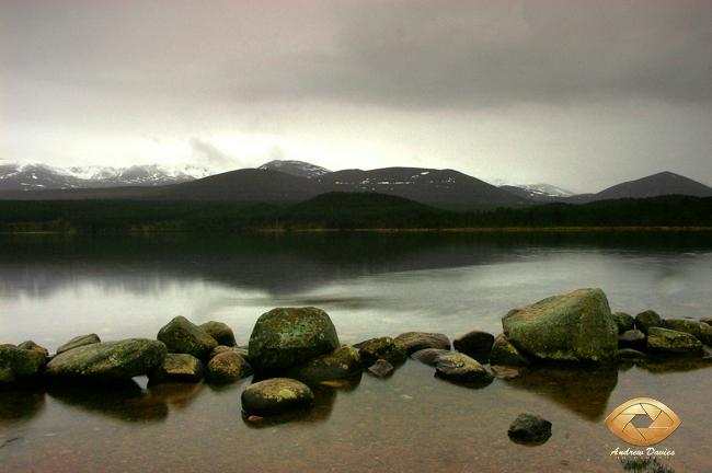 Loch Morlich beach and rocks Scottish Highlands