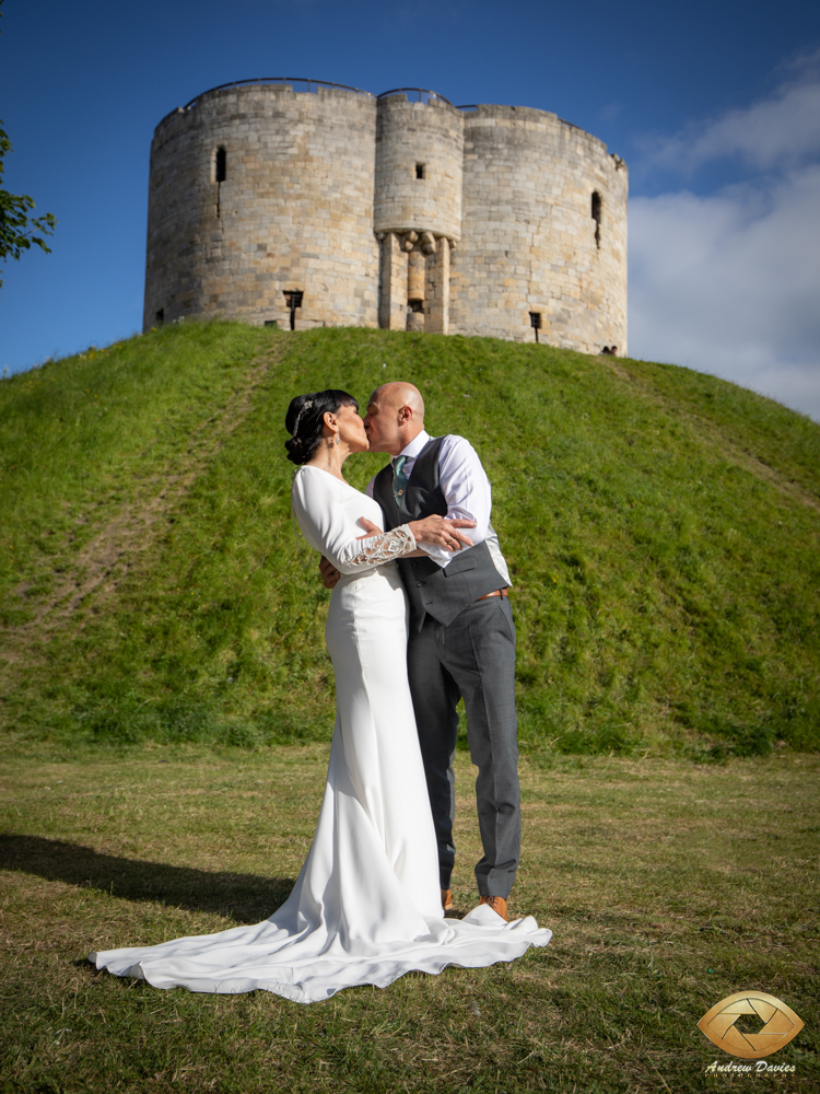 York Clifford Tower Photo - The largest surviving part of York Castle - Clifford Tower makes for a spectacular Photographic Wedding backdrop